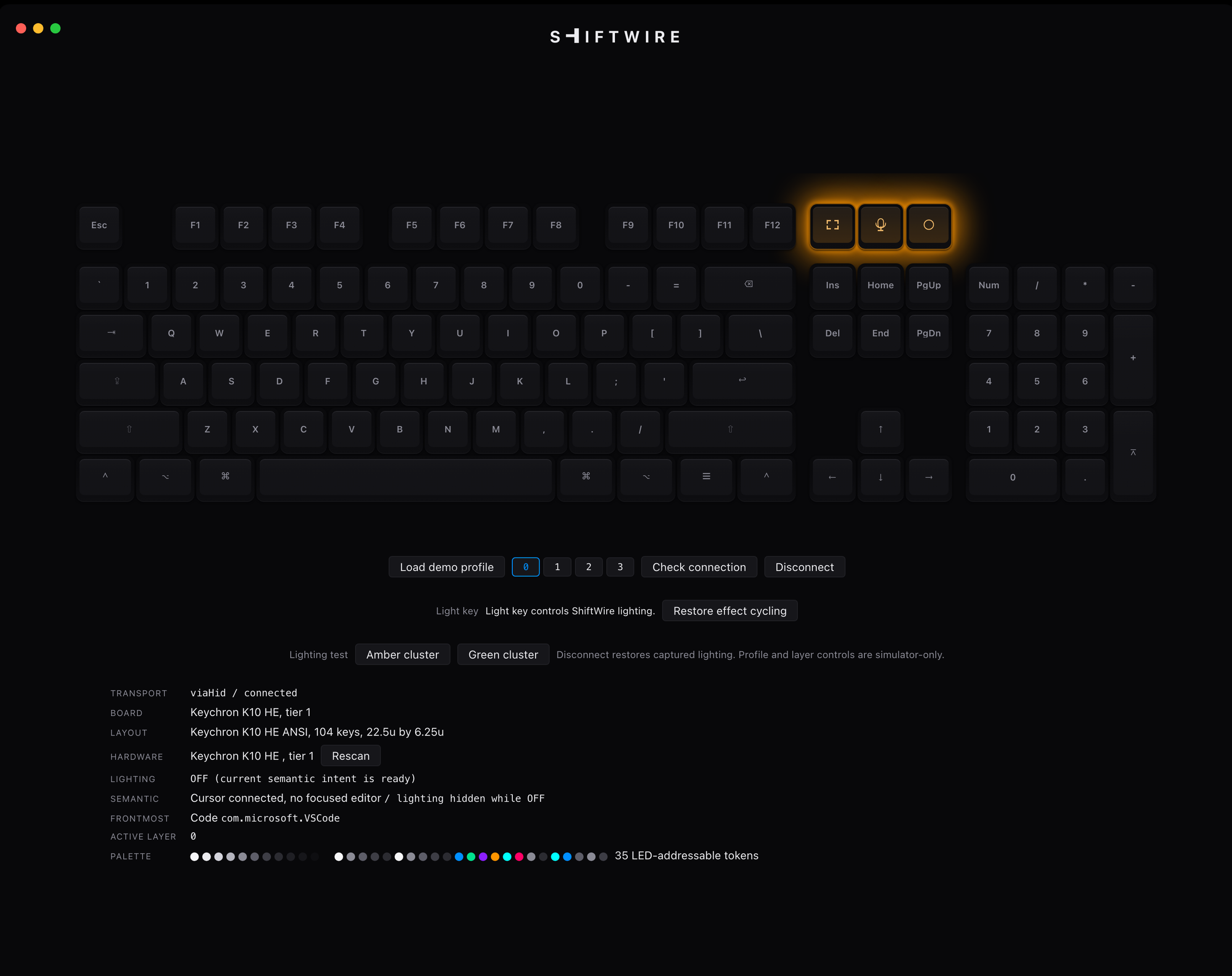 The ShiftWire window: the rendered K10 board with only the three top-right utility keys lit amber, controls beneath it, and a readout listing transport, board, layout, hardware, lighting OFF with current semantic intent ready, semantic state, frontmost app, active layer, and palette.